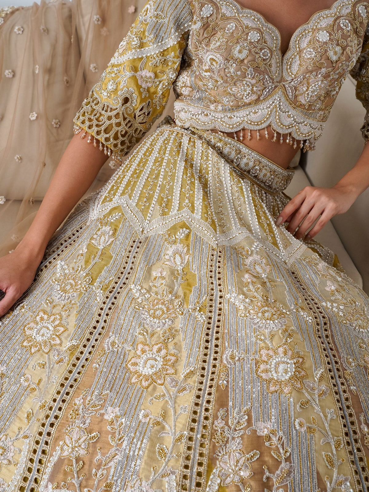 Antique gold cutwork lehenga, blouse embroidery close-up