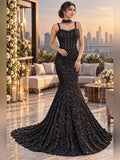 Black sequinned fishtail gown with corset bodice and sweep train
