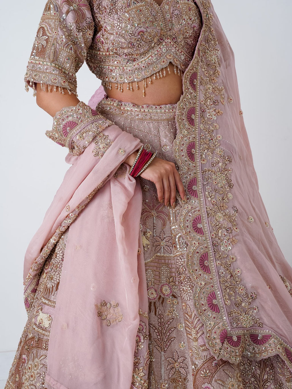 Blush pink embroidered lehenga, side view