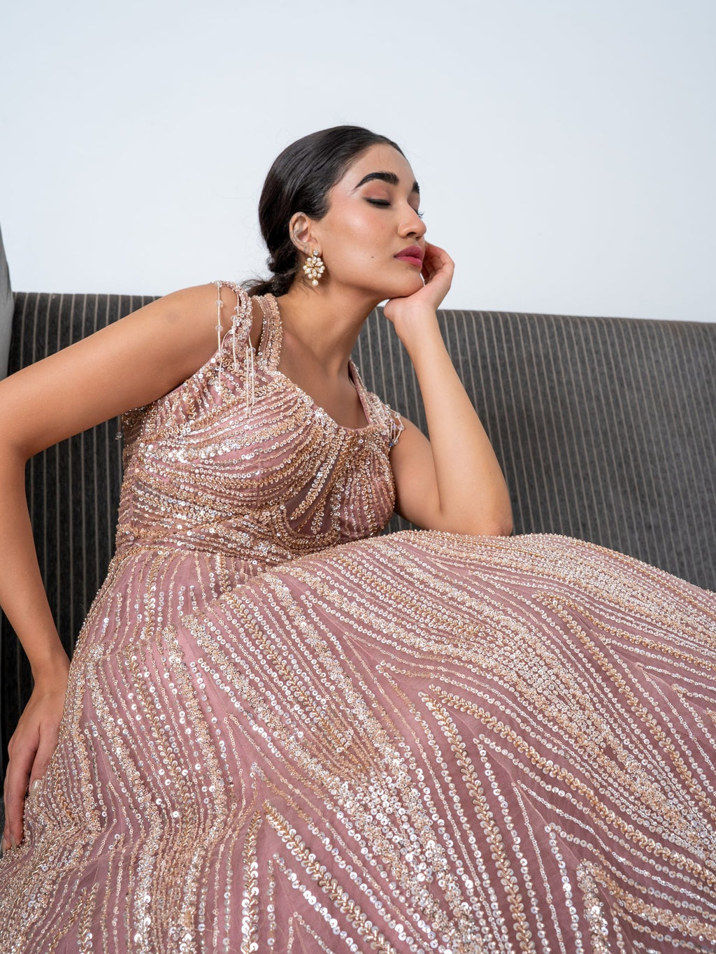 Blush sequin gown, waist up