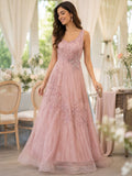 Blush tulle gown with embroidered vine motifs
