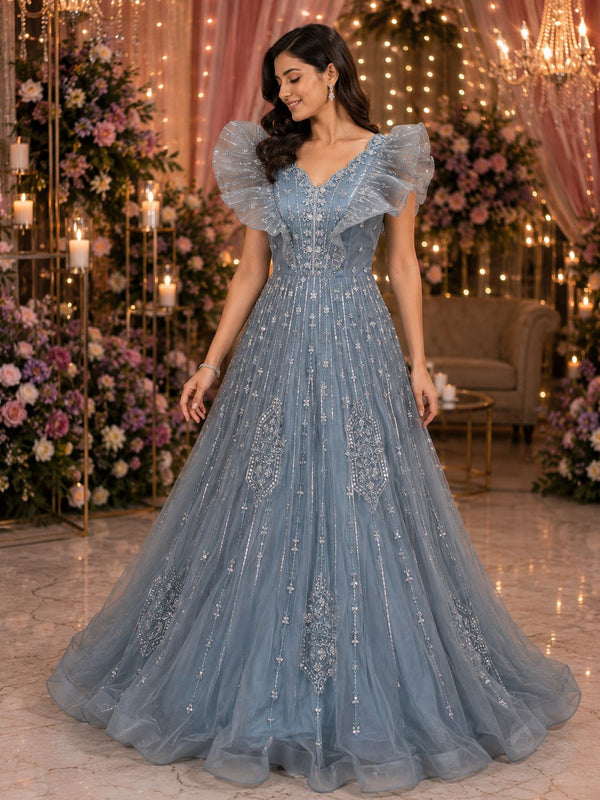 Dusty blue tulle gown with ruffle sleeves and silver embroidery