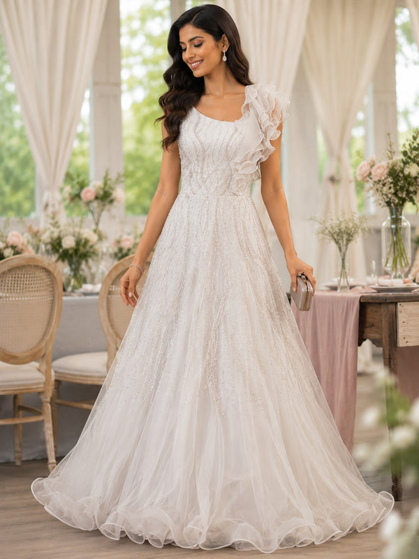 Ivory organza gown with ruffle shoulder detail