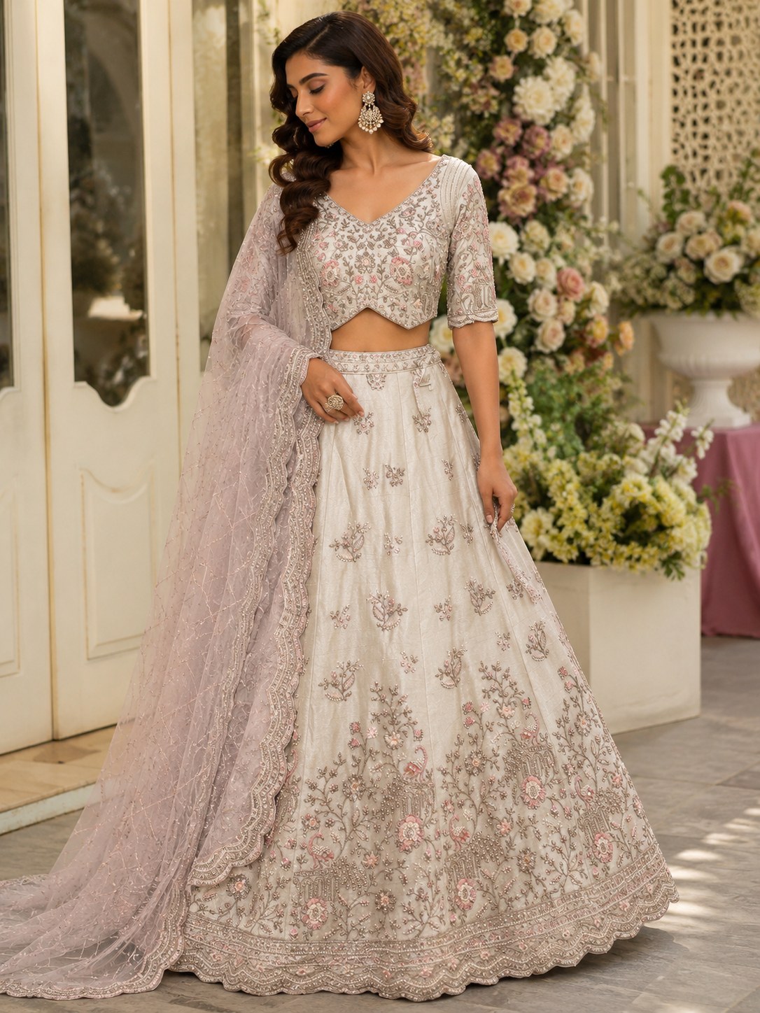 Ivory lehenga with silver floral thread work