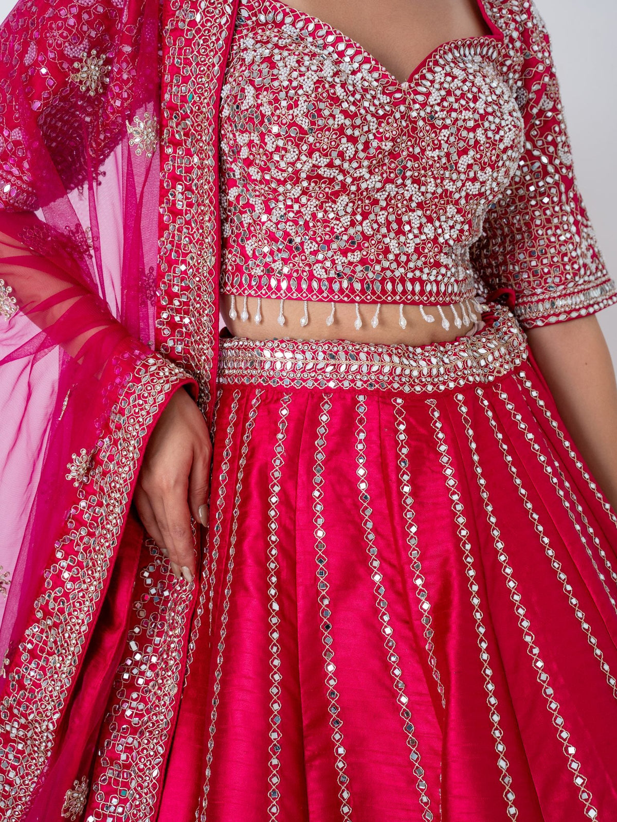 Magenta mirror-work lehenga, blouse embroidery close-up