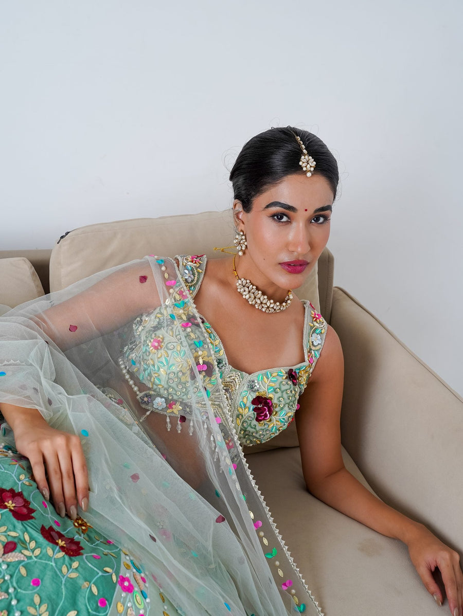 Mint floral appliqué lehenga, seated, full length