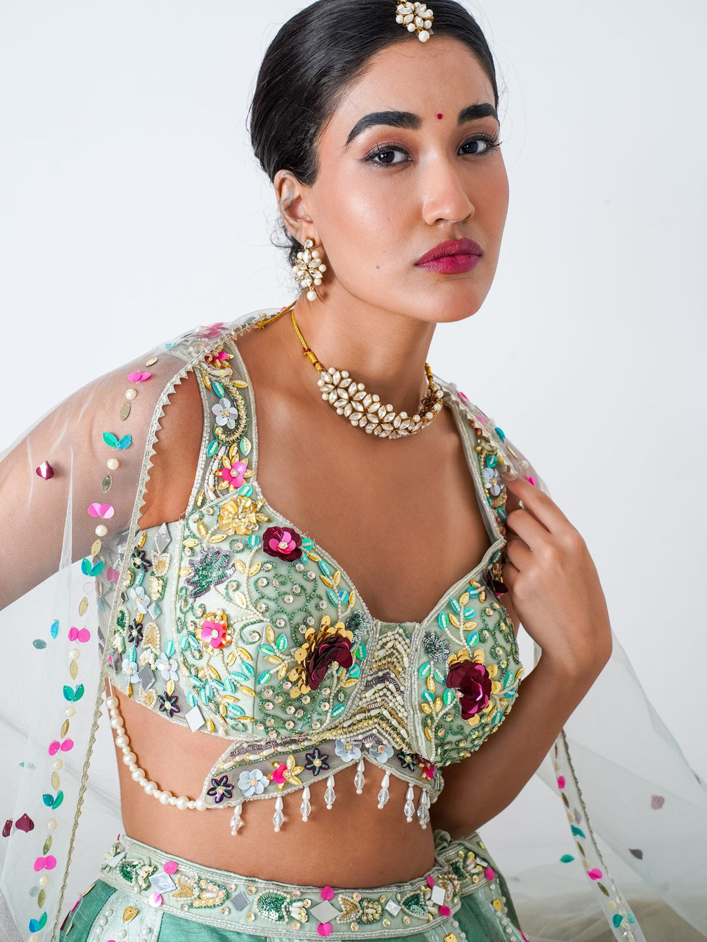 Mint floral appliqué lehenga, blouse and neckline