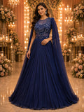 Navy pleated gown with embellished sheer yoke