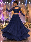 Navy pleated layered lehenga with sequin blouse