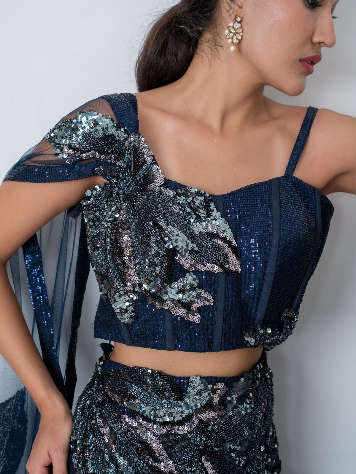 Navy sequin fishtail lehenga, blouse and neckline