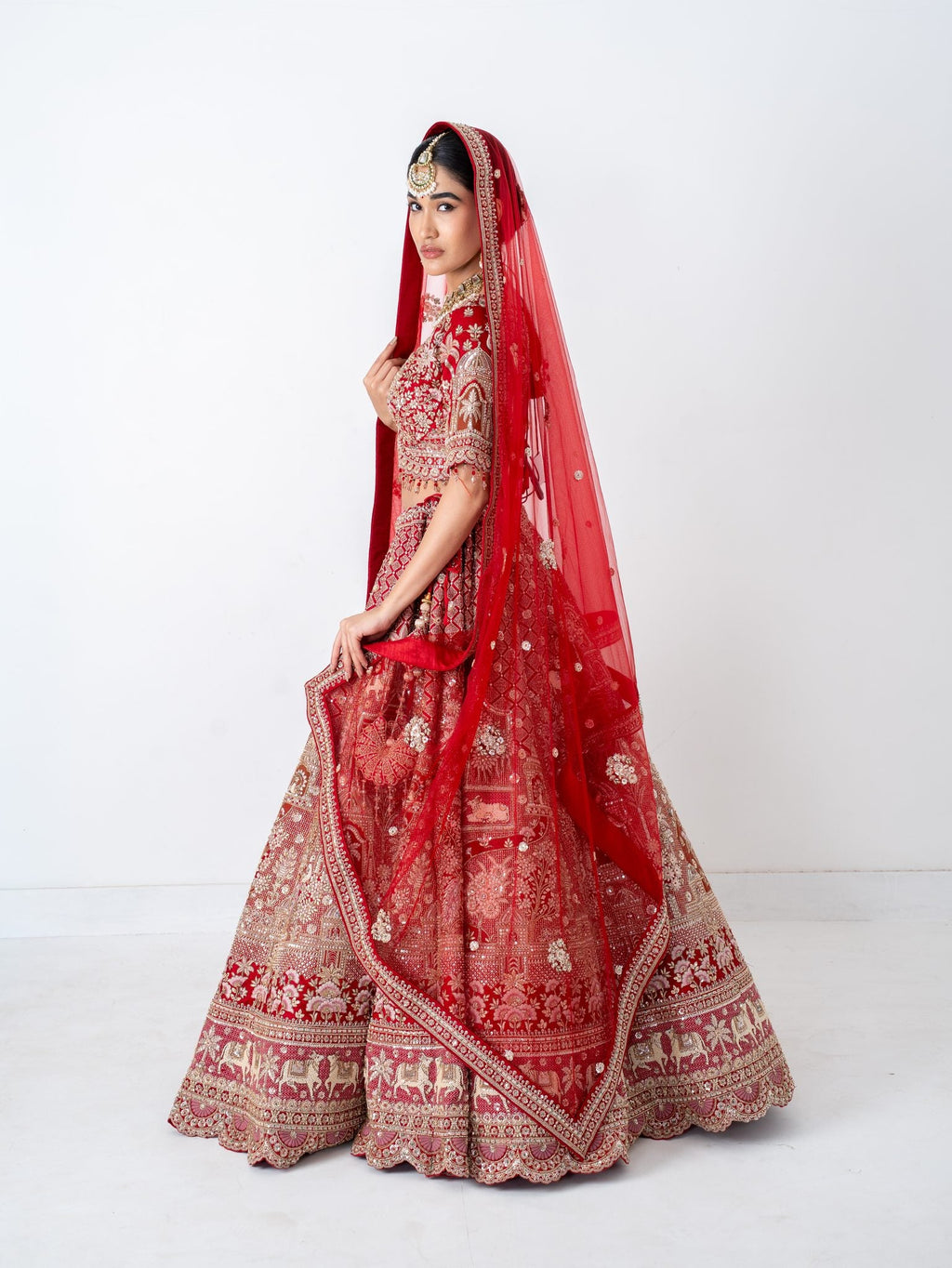 Red velvet bridal lehenga, side view