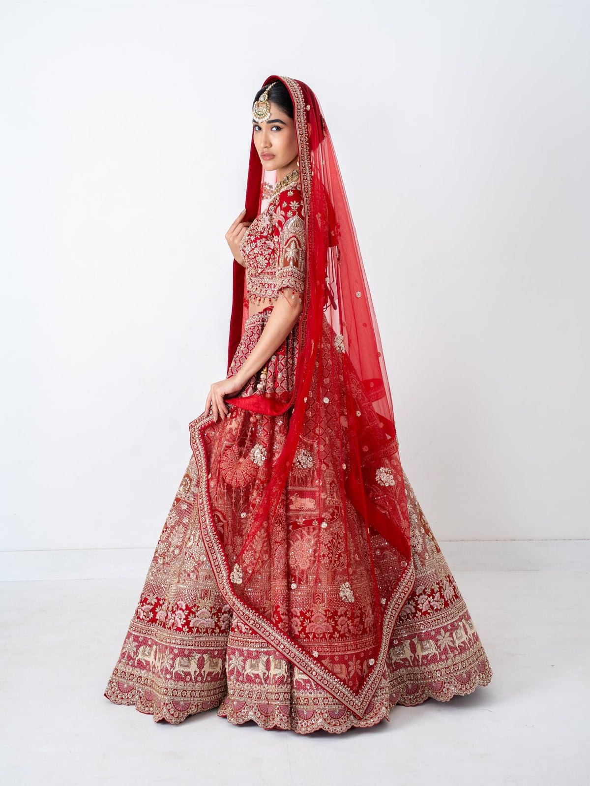 Red velvet bridal lehenga, side view