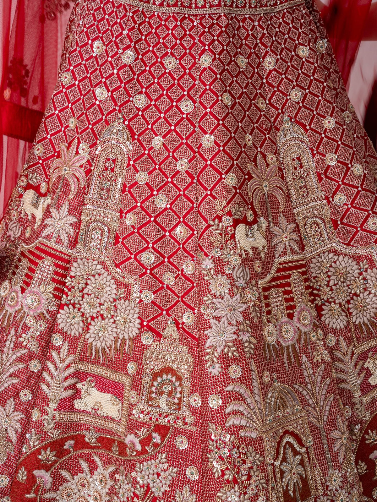 Red velvet bridal lehenga, skirt embroidery close-up