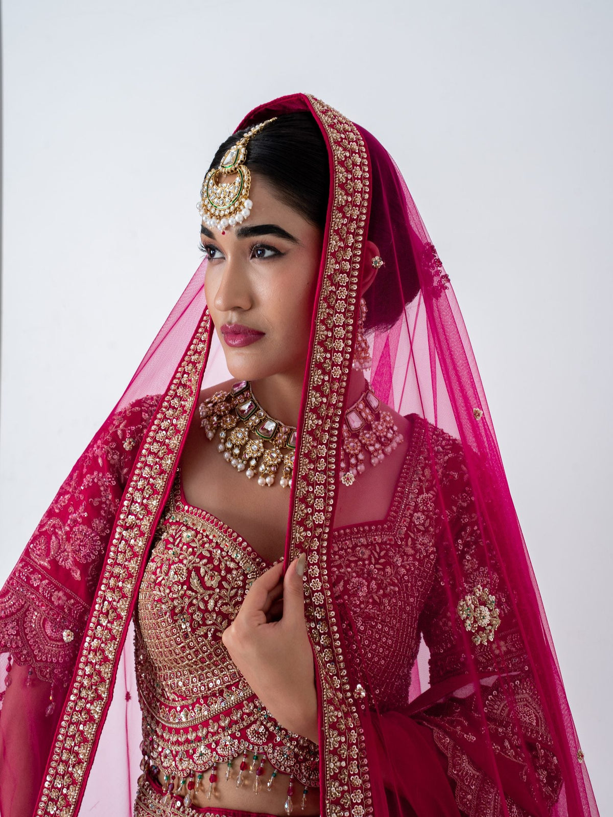 Red zari floral lehenga, blouse and neckline