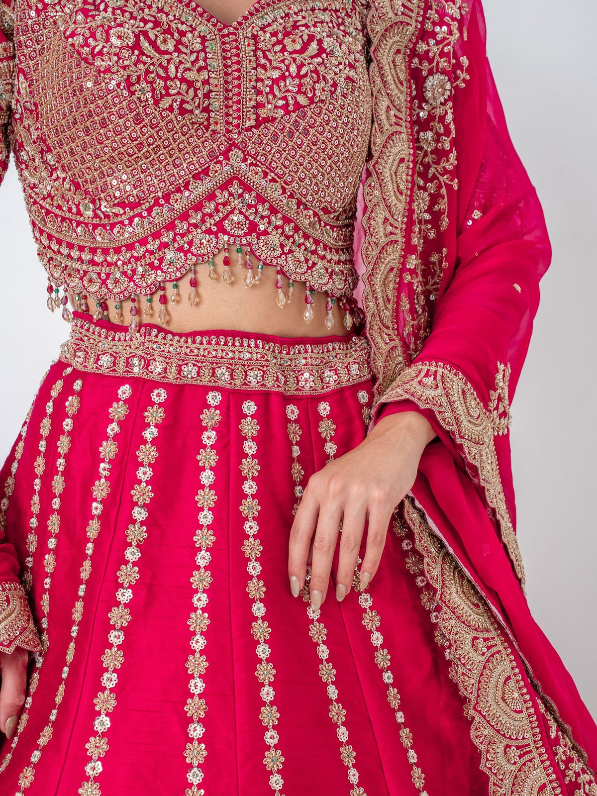 Red zari floral lehenga, blouse embroidery close-up