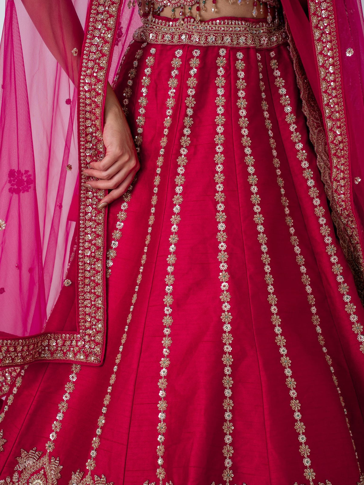 Red zari floral lehenga, skirt embroidery close-up