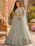 Sage green lehenga with dense mirror embroidery