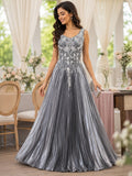 Silver pleated ball gown with embellished bodice
