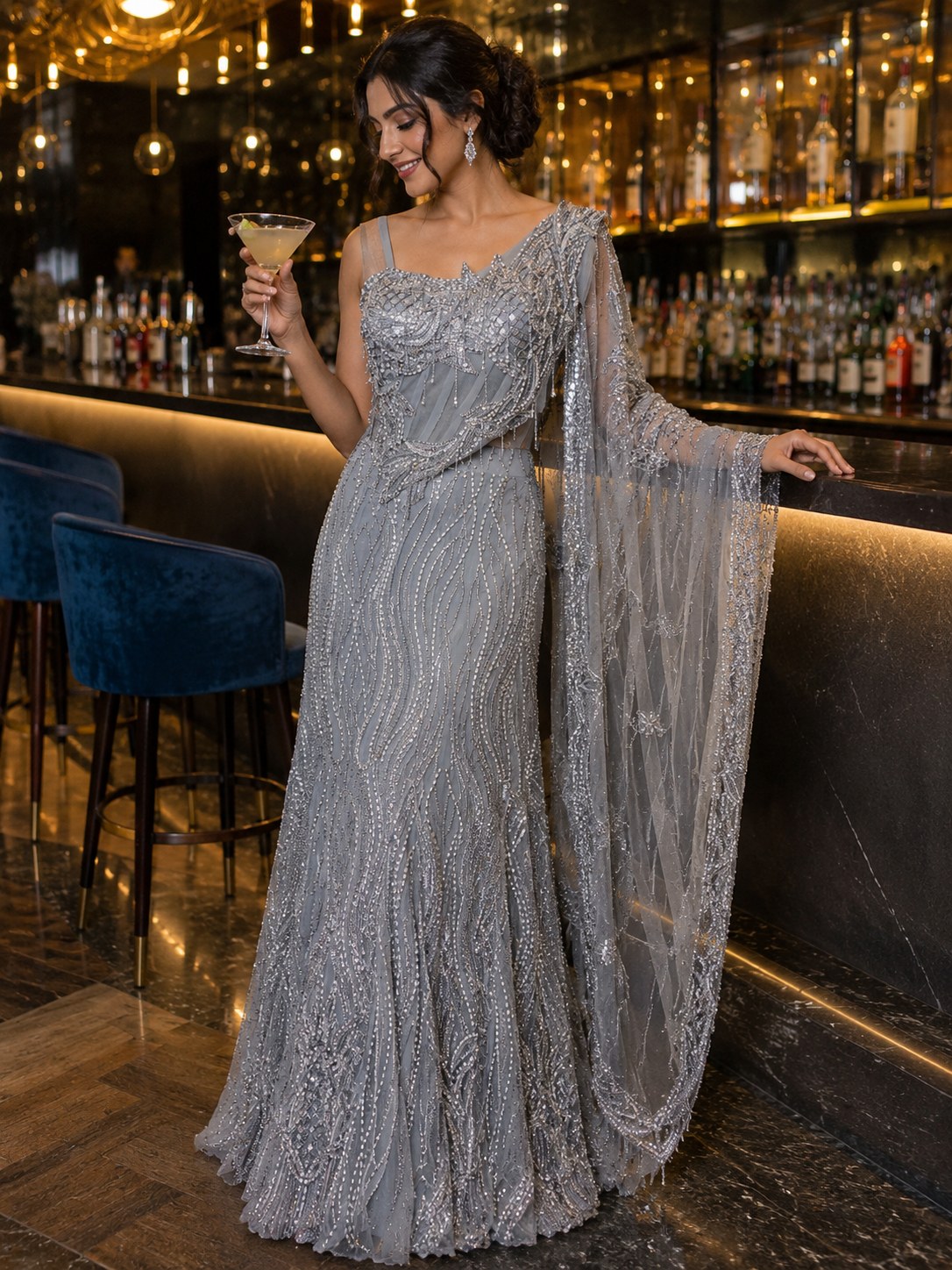 Silver-grey sequinned pre-draped saree gown with embellished shoulder pallu