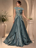 Teal draped gown with embroidered capelet collar